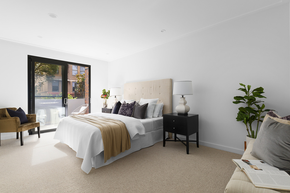 A main bedroom in one of the Rose by Moran apartments